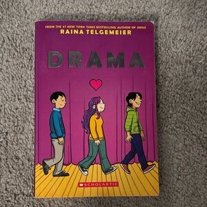 Scholastic Drama Graphic Novel with Purple and Yellow Cover